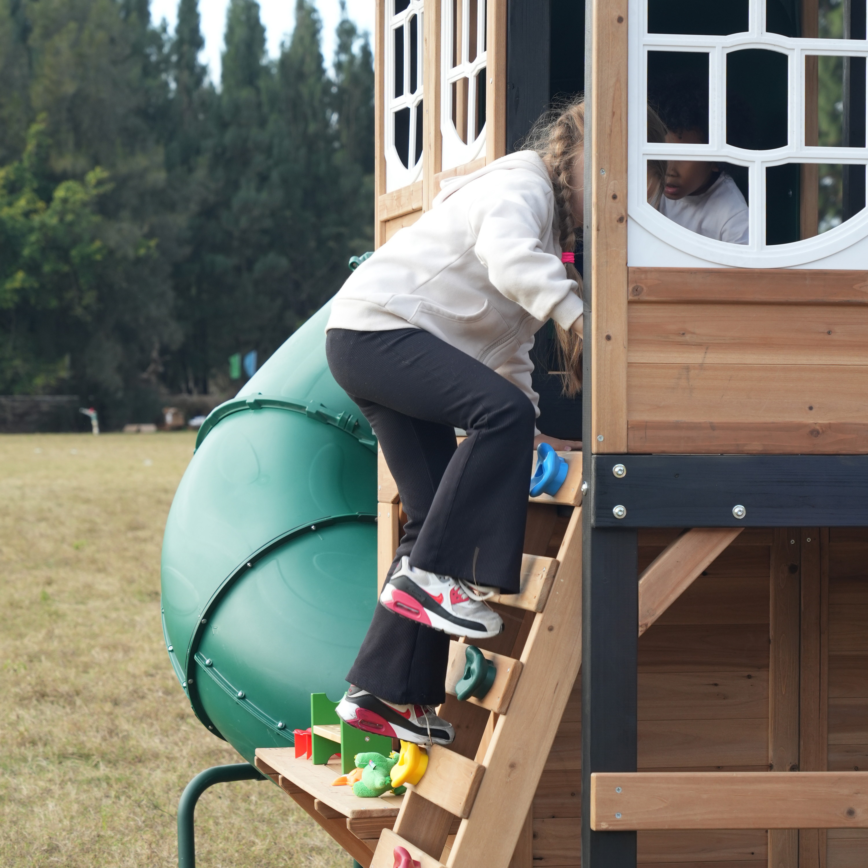AXI Noud Climbing Frame with Playhouse, Swings, Trapeze and Climbing Wall – Pastel Green Slide and Tube Slide