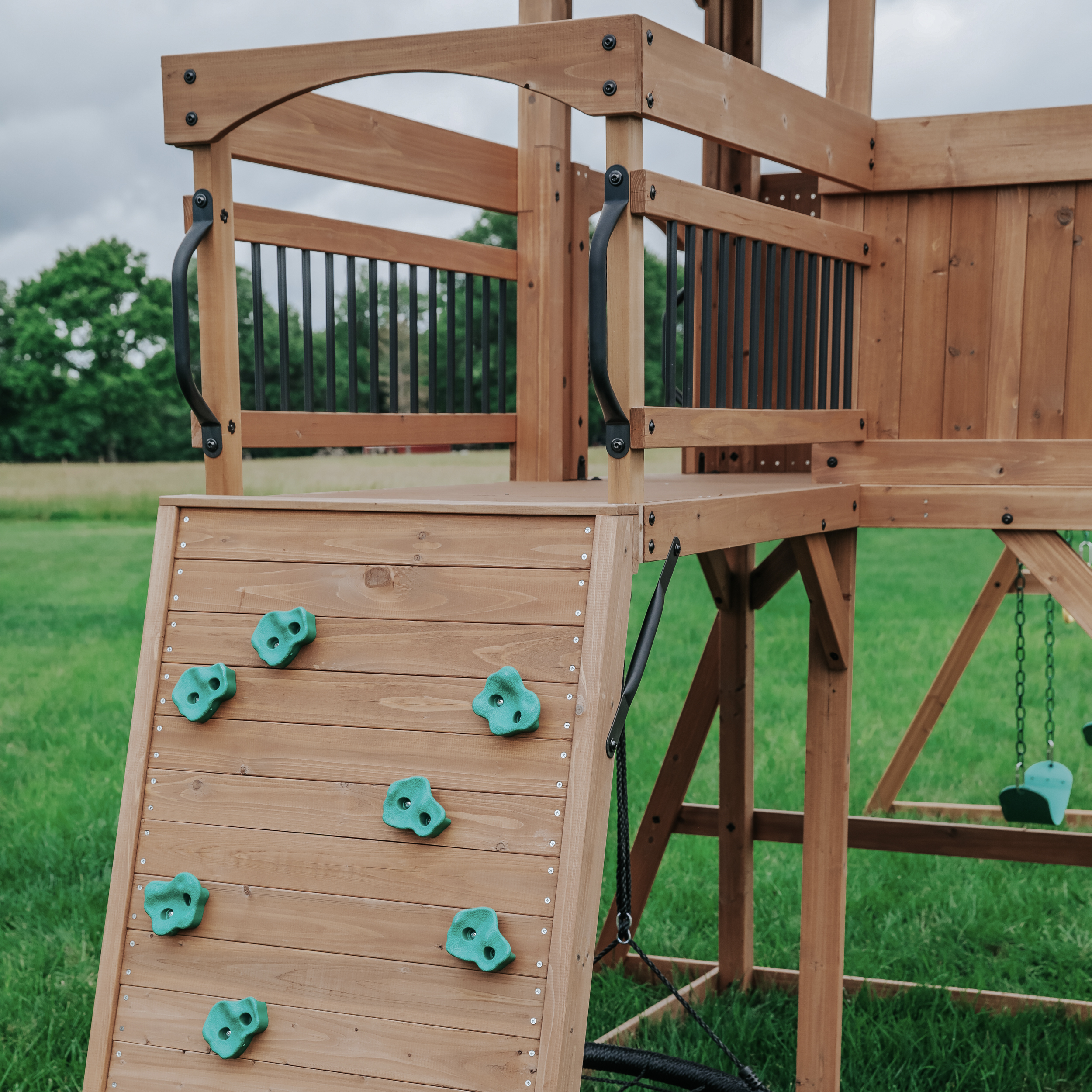 Backyard Discovery Sterling Point Play Set with 3 Swings and Slide - Climbing Wall & Rock Wall - Trapeze - Sandbox - Walkway
